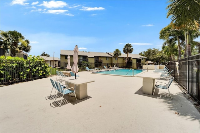 4215 E Bay Dr Unit 1801E, Clearwater, FL 33764 - community pool featuring a patio area