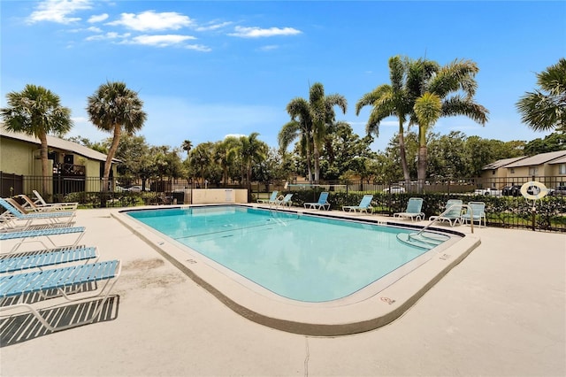 4215 E Bay Dr Unit 1801E, Clearwater, FL 33764 - community pool featuring a patio
