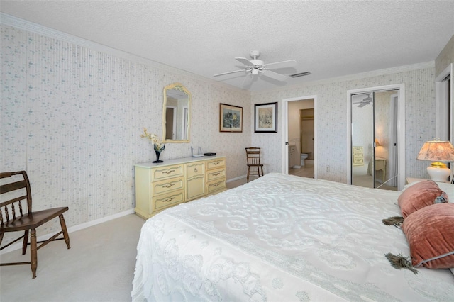 100 Bluff View Dr Unit 511C, Belleair Bluffs, FL 33770 - bedroom featuring crown molding, a textured ceiling, light carpet, wallpapered walls, and a ceiling fan