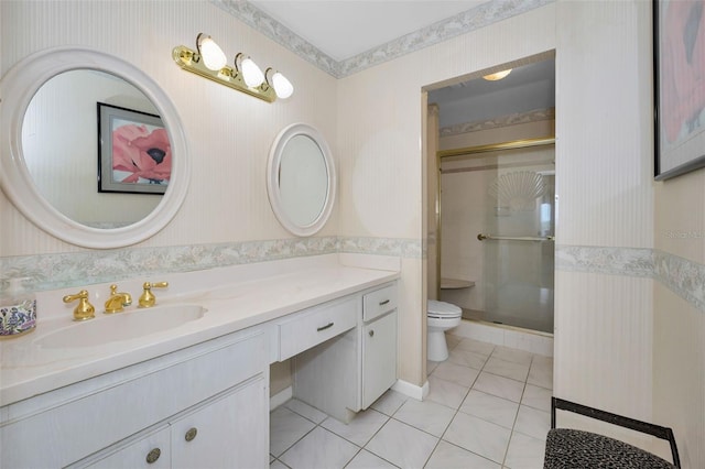 100 Bluff View Dr Unit 511C, Belleair Bluffs, FL 33770 - bathroom featuring vanity, a shower stall, tile patterned flooring, and wallpapered walls