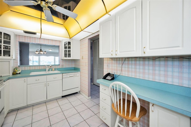 100 Bluff View Dr Unit 511C, Belleair Bluffs, FL 33770 - kitchen featuring white appliances, ceiling fan, glass insert cabinets, light countertops, and white cabinetry