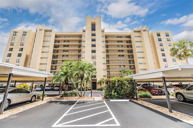 2621 Cove Cay Dr Unit 302, Clearwater, FL 33760 - view of apartment building / complex with covered parking