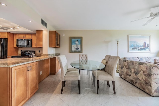 2621 Cove Cay Dr Unit 302, Clearwater, FL 33760 - dining area featuring a ceiling fan, recessed lighting, and light tile patterned floors