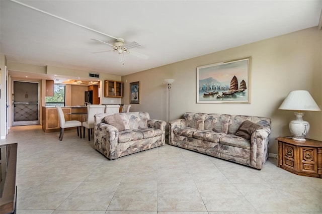 2621 Cove Cay Dr Unit 302, Clearwater, FL 33760 - living area with a ceiling fan and light tile patterned floors