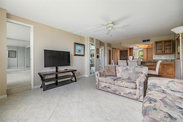 2621 Cove Cay Dr Unit 302, Clearwater, FL 33760 - living room featuring ceiling fan and light tile patterned floors