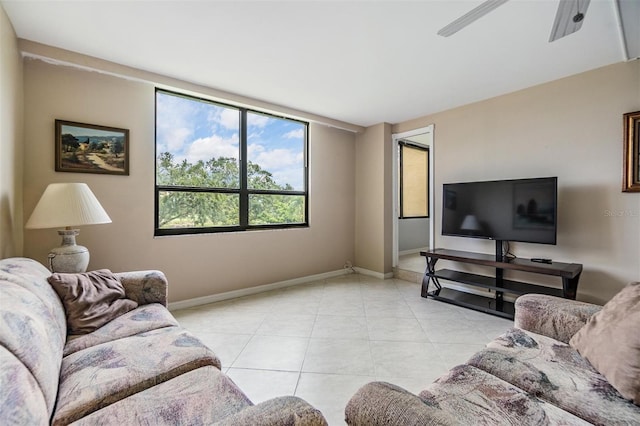 2621 Cove Cay Dr Unit 302, Clearwater, FL 33760 - living room with light tile patterned flooring and ceiling fan
