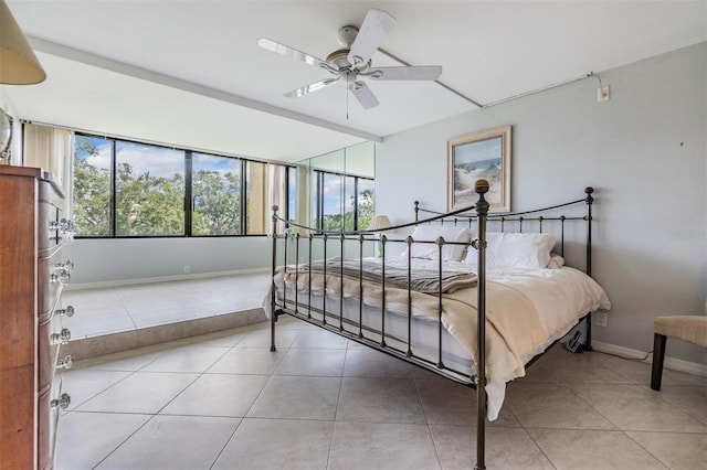 2621 Cove Cay Dr Unit 302, Clearwater, FL 33760 - bedroom with tile patterned flooring and ceiling fan