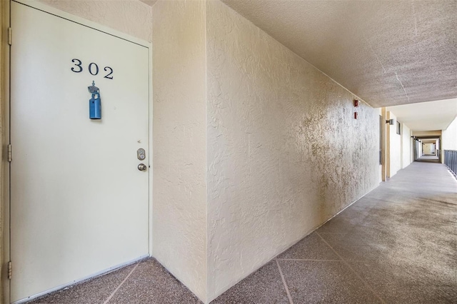 2621 Cove Cay Dr Unit 302, Clearwater, FL 33760 - view of exterior entry featuring stucco siding