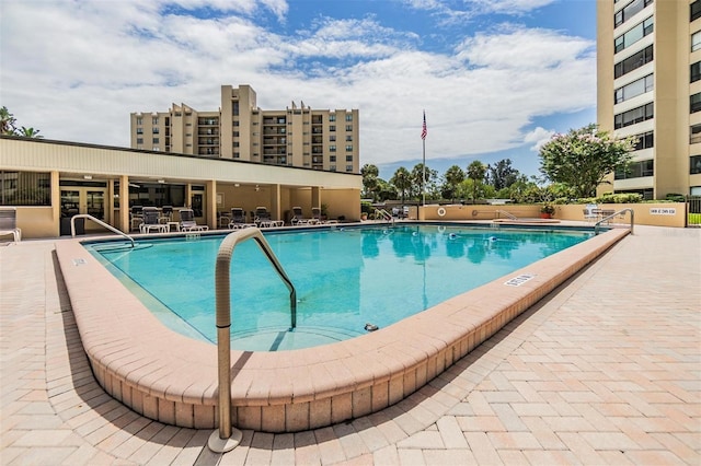 2621 Cove Cay Dr Unit 302, Clearwater, FL 33760 - community pool featuring a patio