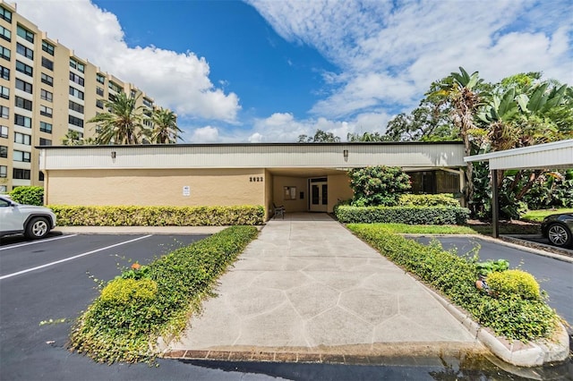 2621 Cove Cay Dr Unit 302, Clearwater, FL 33760 - view of property featuring uncovered parking
