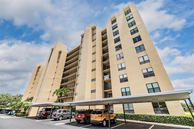 2621 Cove Cay Dr Unit 302, Clearwater, FL 33760 - view of apartment building / complex with covered parking