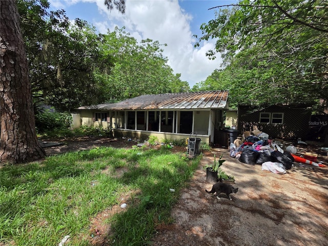5800 SE 33rd Ave, Ocala, FL 34480 - rear view of property featuring metal roof