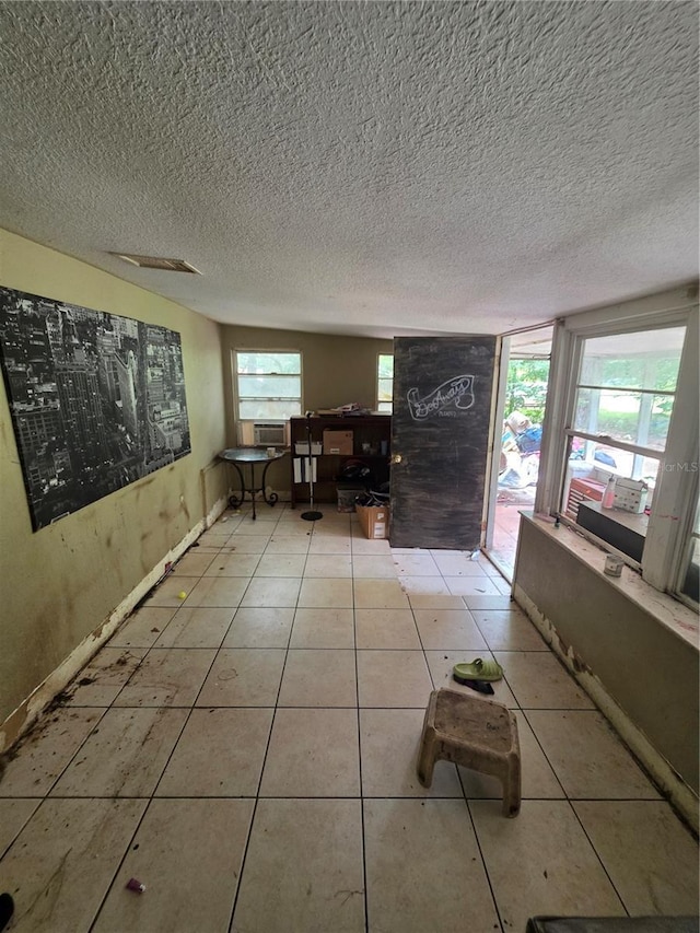 5800 SE 33rd Ave, Ocala, FL 34480 - tiled dining area with an office area, a textured ceiling, and cooling unit