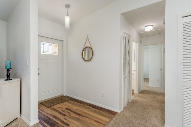 630 Kirkland Cir, Dunedin, FL 34698 - entrance foyer featuring baseboards and wood finished floors