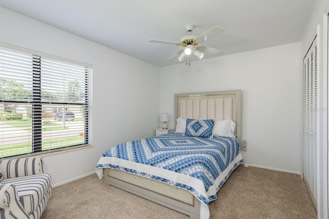 630 Kirkland Cir, Dunedin, FL 34698 - bedroom featuring carpet flooring, multiple windows, and a closet