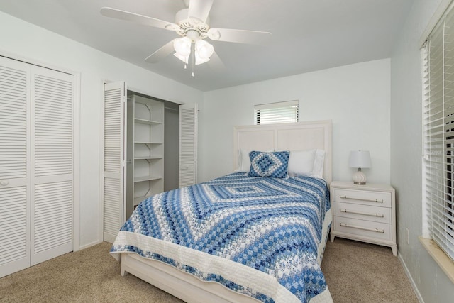 630 Kirkland Cir, Dunedin, FL 34698 - bedroom featuring carpet, multiple closets, and ceiling fan