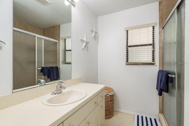 630 Kirkland Cir, Dunedin, FL 34698 - bathroom featuring vanity and a stall shower