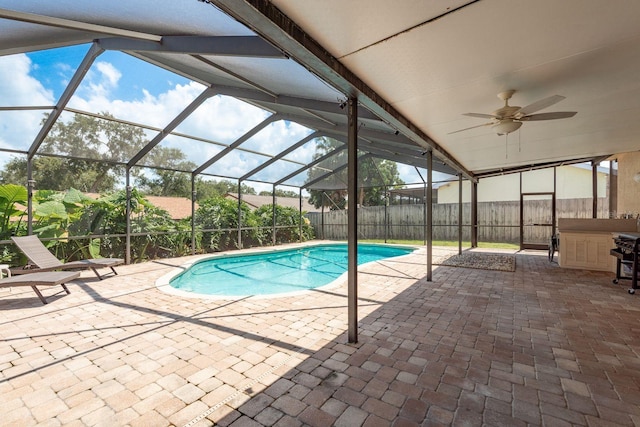 630 Kirkland Cir, Dunedin, FL 34698 - view of pool with a patio area, a fenced backyard, ceiling fan, and a lanai