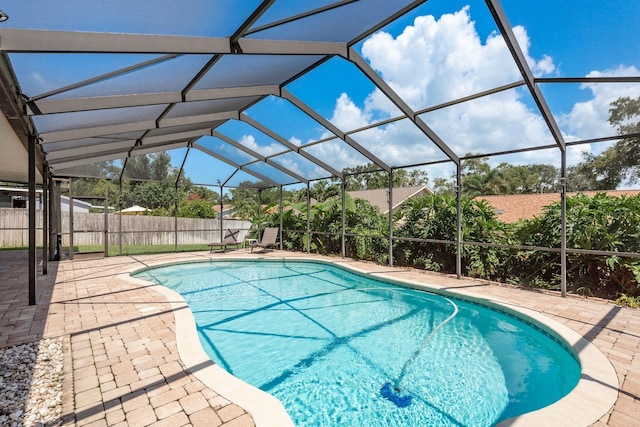 630 Kirkland Cir, Dunedin, FL 34698 - view of swimming pool with a patio area and glass enclosure