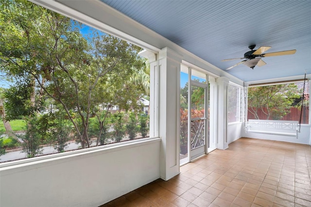 1400 Cherry St NE, Saint Petersburg, FL 33704 - unfurnished sunroom featuring tile patterned floors