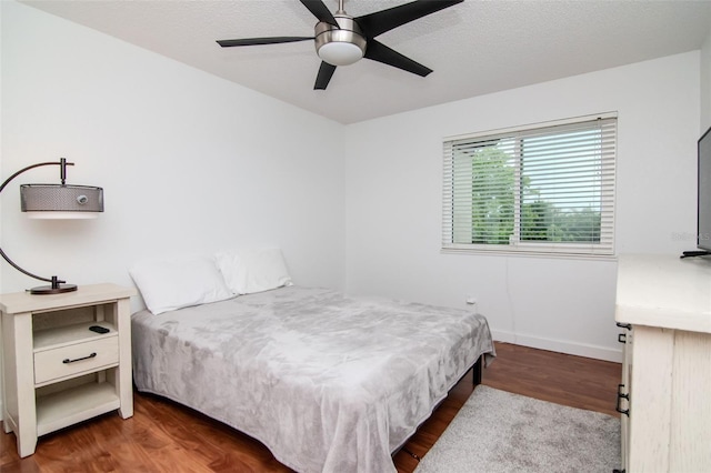 10265 Gandy Blvd N Unit 1702, Saint Petersburg, FL 33702 - bedroom with wood finished floors, baseboards, and ceiling fan