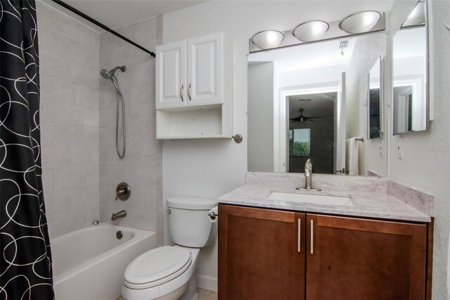 10265 Gandy Blvd N Unit 1702, Saint Petersburg, FL 33702 - full bath with ceiling fan, shower / tub combo with curtain, vanity, and toilet