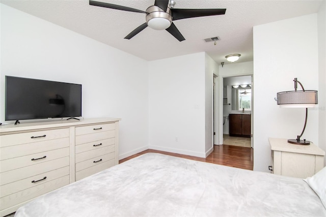 10265 Gandy Blvd N Unit 1702, Saint Petersburg, FL 33702 - bedroom with wood finished floors, baseboards, and a ceiling fan