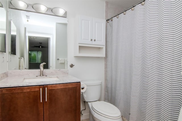 10265 Gandy Blvd N Unit 1702, Saint Petersburg, FL 33702 - bathroom featuring vanity, toilet, and curtained shower