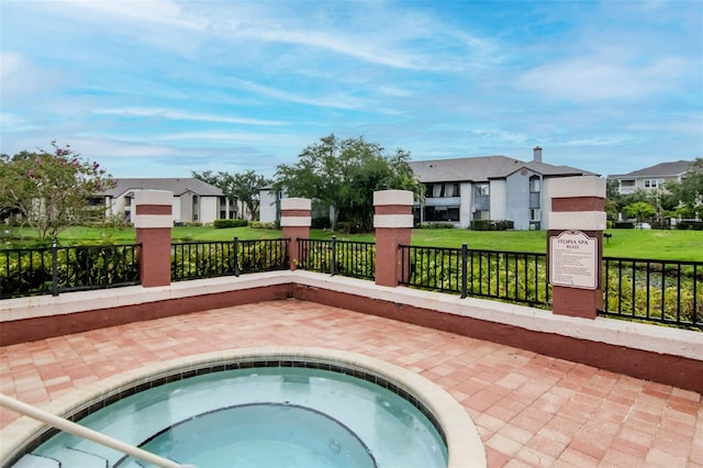 10265 Gandy Blvd N Unit 1702, Saint Petersburg, FL 33702 - view of swimming pool featuring a residential view and a community hot tub