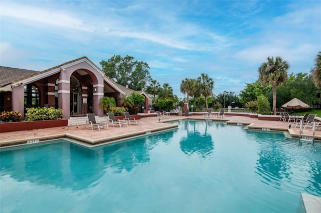 10265 Gandy Blvd N Unit 1702, Saint Petersburg, FL 33702 - community pool featuring a patio