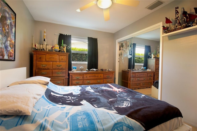 2010 6th Ave SW, Largo, FL 33770 - bedroom with a closet and a ceiling fan