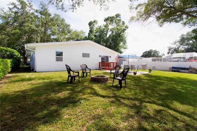2010 6th Ave SW, Largo, FL 33770 - view of grassy yard with a fire pit