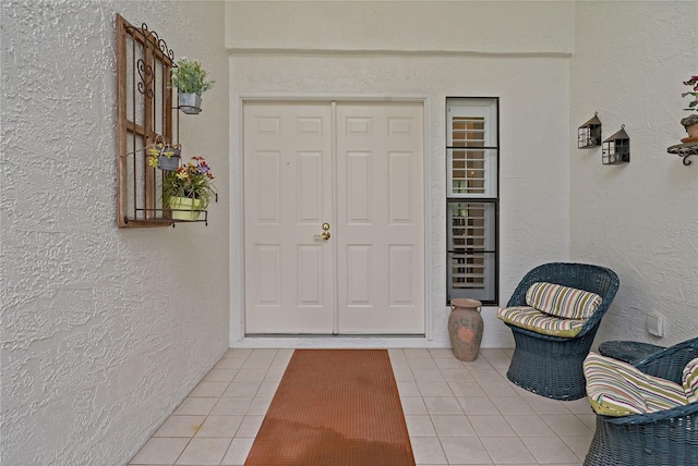 1401 Camelot Ct, Palm Harbor, FL 34684 - property entrance with stucco siding