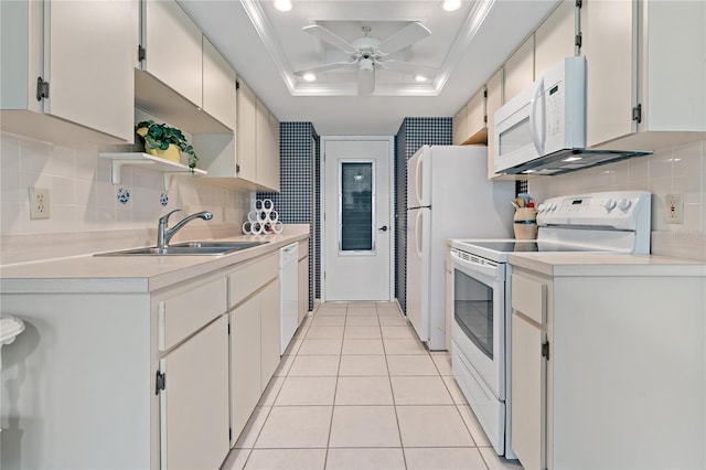 1401 Camelot Ct, Palm Harbor, FL 34684 - kitchen with white appliances, a sink, a ceiling fan, decorative backsplash, and recessed lighting