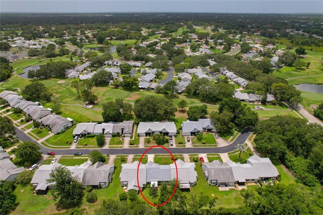 1401 Camelot Ct, Palm Harbor, FL 34684 - aerial view of residential area with a nearby body of water and a golf club