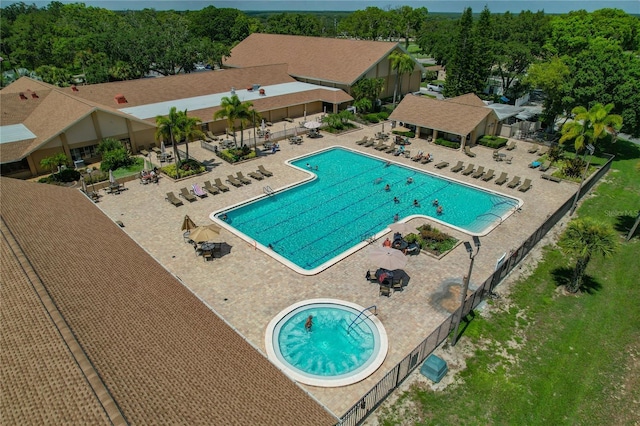 1401 Camelot Ct, Palm Harbor, FL 34684 - community pool with a patio