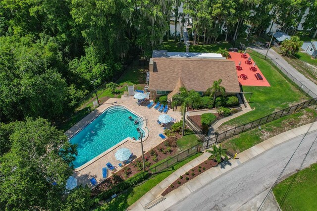 1401 Camelot Ct, Palm Harbor, FL 34684 - view from above of property featuring a pool