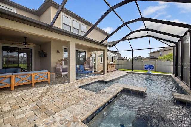 7570 Sweeter Tide Trl, Wesley Chapel, FL 33545 - view of patio / terrace with an outdoor hangout area, an in-ground hot tub, a ceiling fan, and a lanai