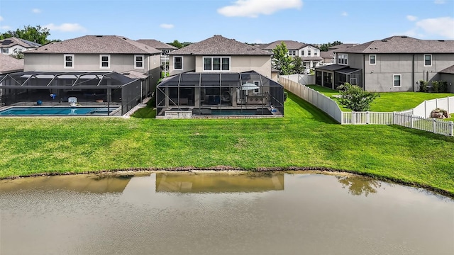 7570 Sweeter Tide Trl, Wesley Chapel, FL 33545 - rear view of property with an outdoor pool, a residential view, and a fenced backyard