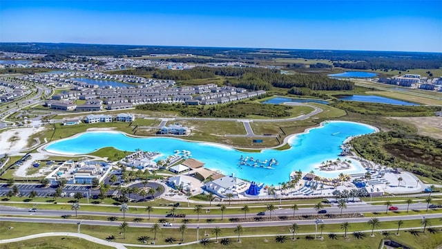 7570 Sweeter Tide Trl, Wesley Chapel, FL 33545 - aerial view of property and surrounding area featuring a large body of water and a pool area