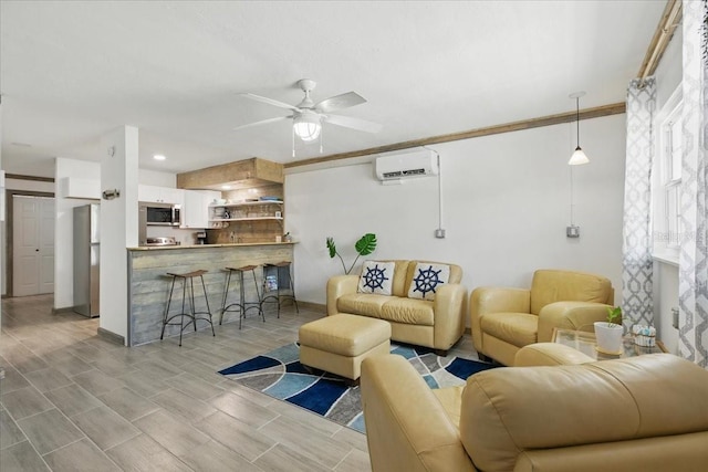 511 1st St, Cedar Key, FL 32625 - living room with a wall mounted AC, a ceiling fan, and wood tiled floors