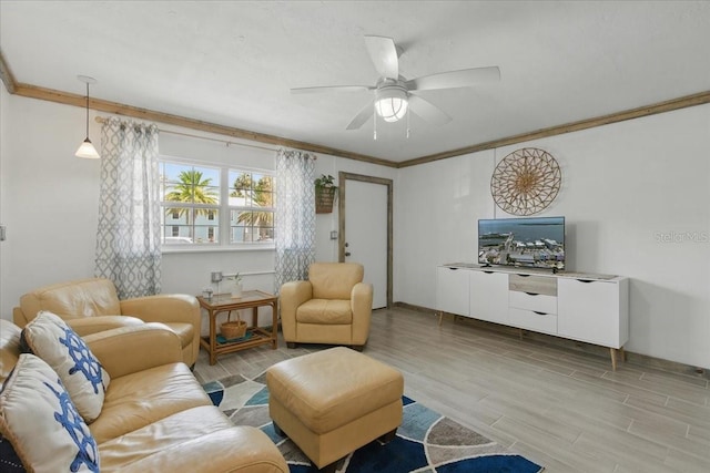 511 1st St, Cedar Key, FL 32625 - living room featuring wood finished floors, ceiling fan, and crown molding