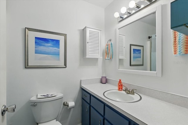 511 1st St, Cedar Key, FL 32625 - bathroom featuring vanity and toilet