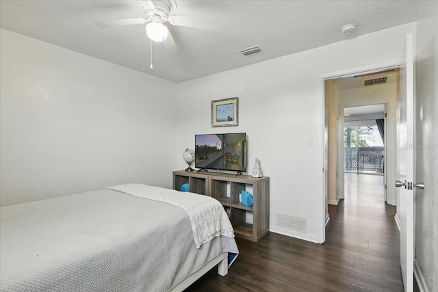 511 1st St, Cedar Key, FL 32625 - bedroom with wood finished floors and a ceiling fan