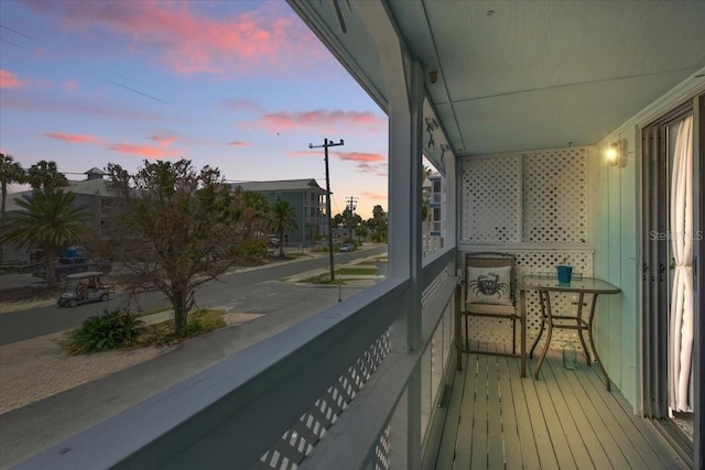 511 1st St, Cedar Key, FL 32625 - view of balcony at dusk