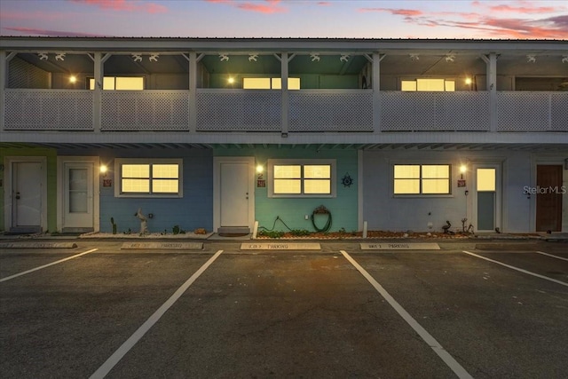 511 1st St, Cedar Key, FL 32625 - view of property featuring uncovered parking and concrete block siding
