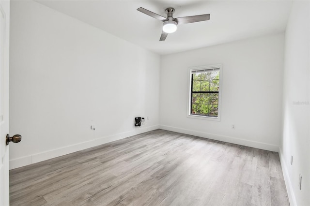 2171 Portofino Pl Unit 27-2725, Palm Harbor, FL 34683 - spare room with light wood-type flooring, baseboards, and a ceiling fan