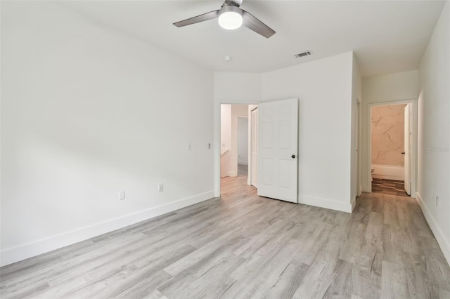2171 Portofino Pl Unit 27-2725, Palm Harbor, FL 34683 - unfurnished bedroom featuring light wood-style floors, baseboards, and a ceiling fan