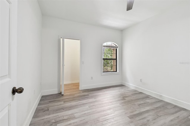 2171 Portofino Pl Unit 27-2725, Palm Harbor, FL 34683 - unfurnished room with light wood-type flooring, baseboards, and ceiling fan