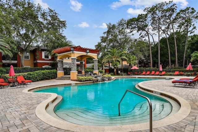 2171 Portofino Pl Unit 27-2725, Palm Harbor, FL 34683 - community pool featuring a patio